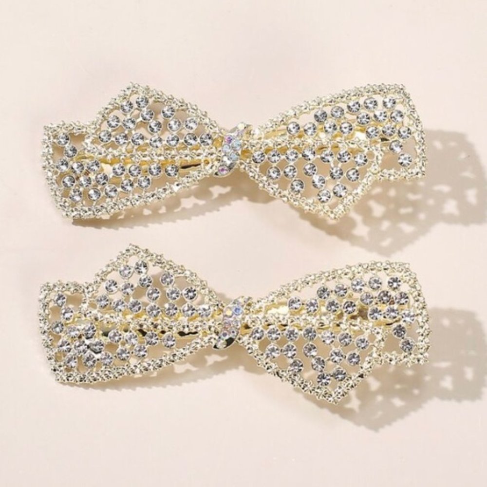 Two piece rhinestone bow hair clips. New.